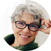Older woman in glasses smiling