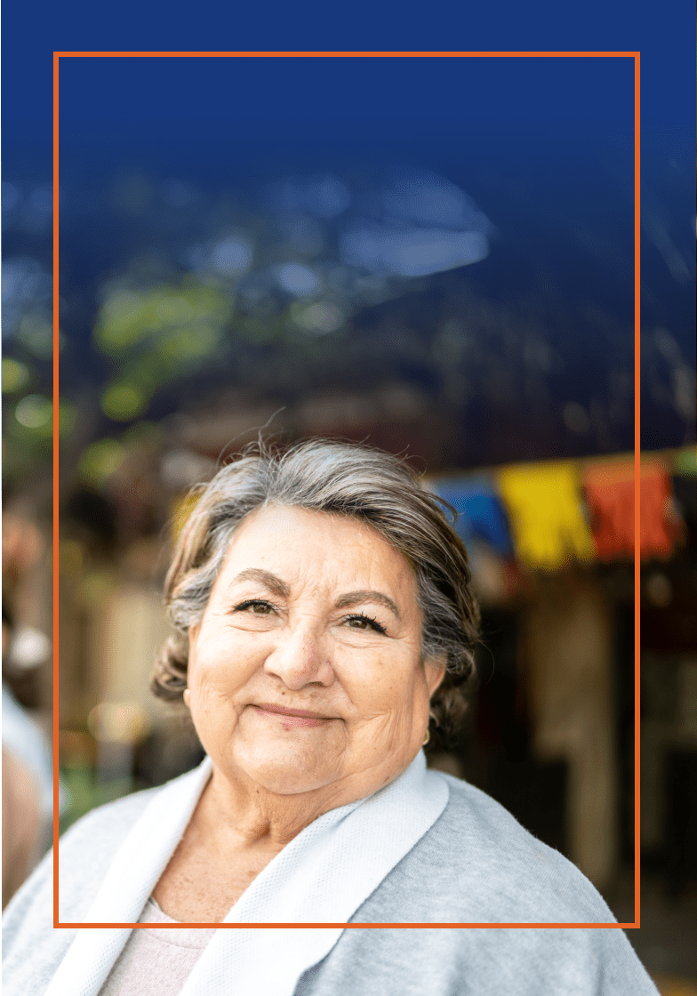 Older woman smiling outside
