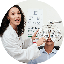 Doctor giving an eye exam