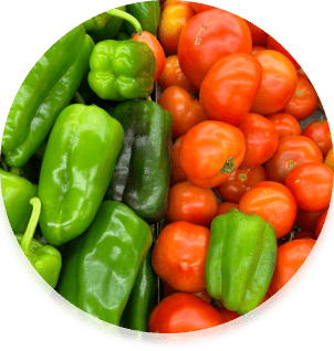 A pile of peppers and tomatoes