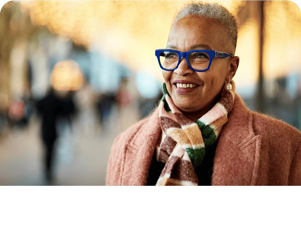 Older woman in glasses smiling