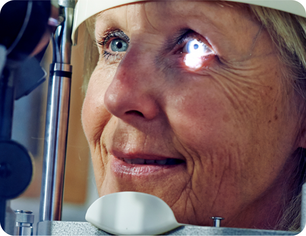 Elderly woman getting an eye exam