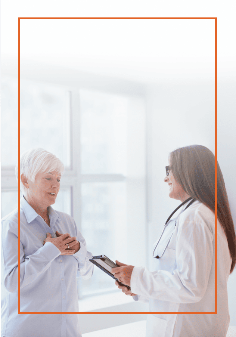 Older woman speaking with her doctor